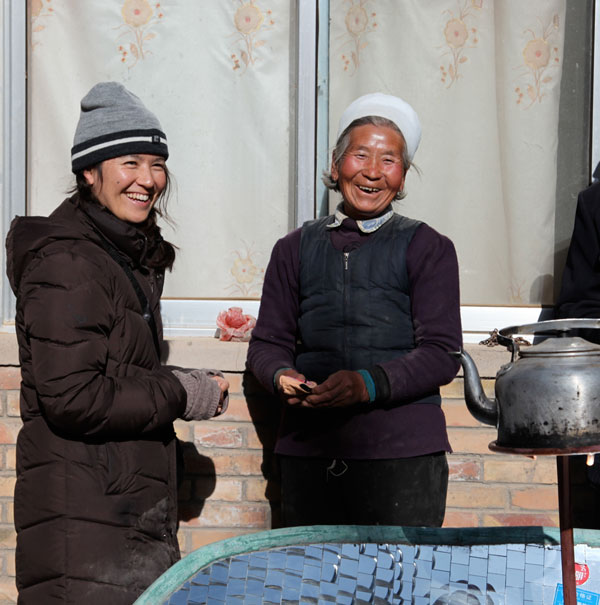 Jasmine and local, with a solar cookstove, Ningxia China